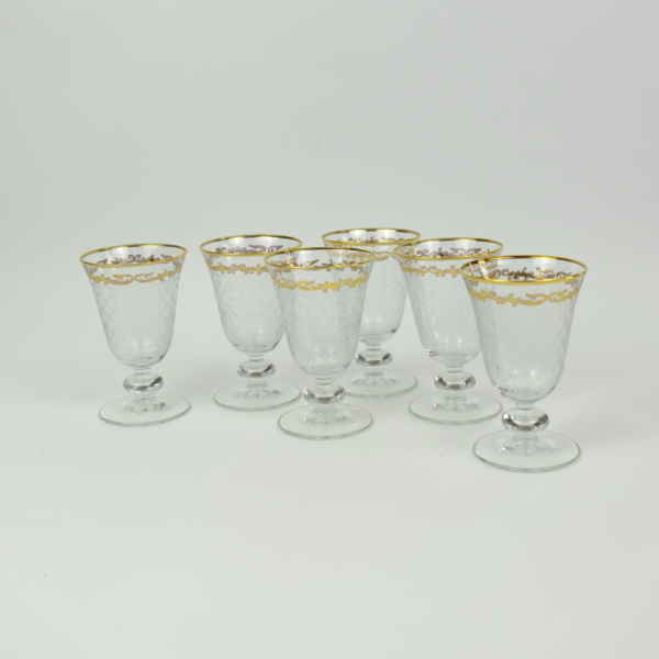 Set of 6 pieces of glass cup with golden pattern frame with a base. Dubai United Arab Emirates