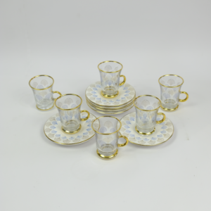 Set of 6 pieces of glass tea cups and porcelain saucer with a special pattern design Dubai United Arab Emirates