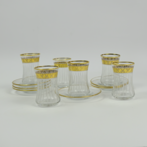 Set of 6 pieces of glass tea cups and saucer with a bold golden line pattern Dubai United Arab Emirates