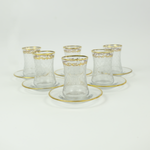 Set of 6 pieces of glass tea cups and saucer with a bold golden line Dubai United Arab Emirates