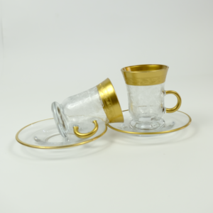 Set of 6 pieces of glass tea cups and saucer with a bold golden line Dubai United Arab Emirates